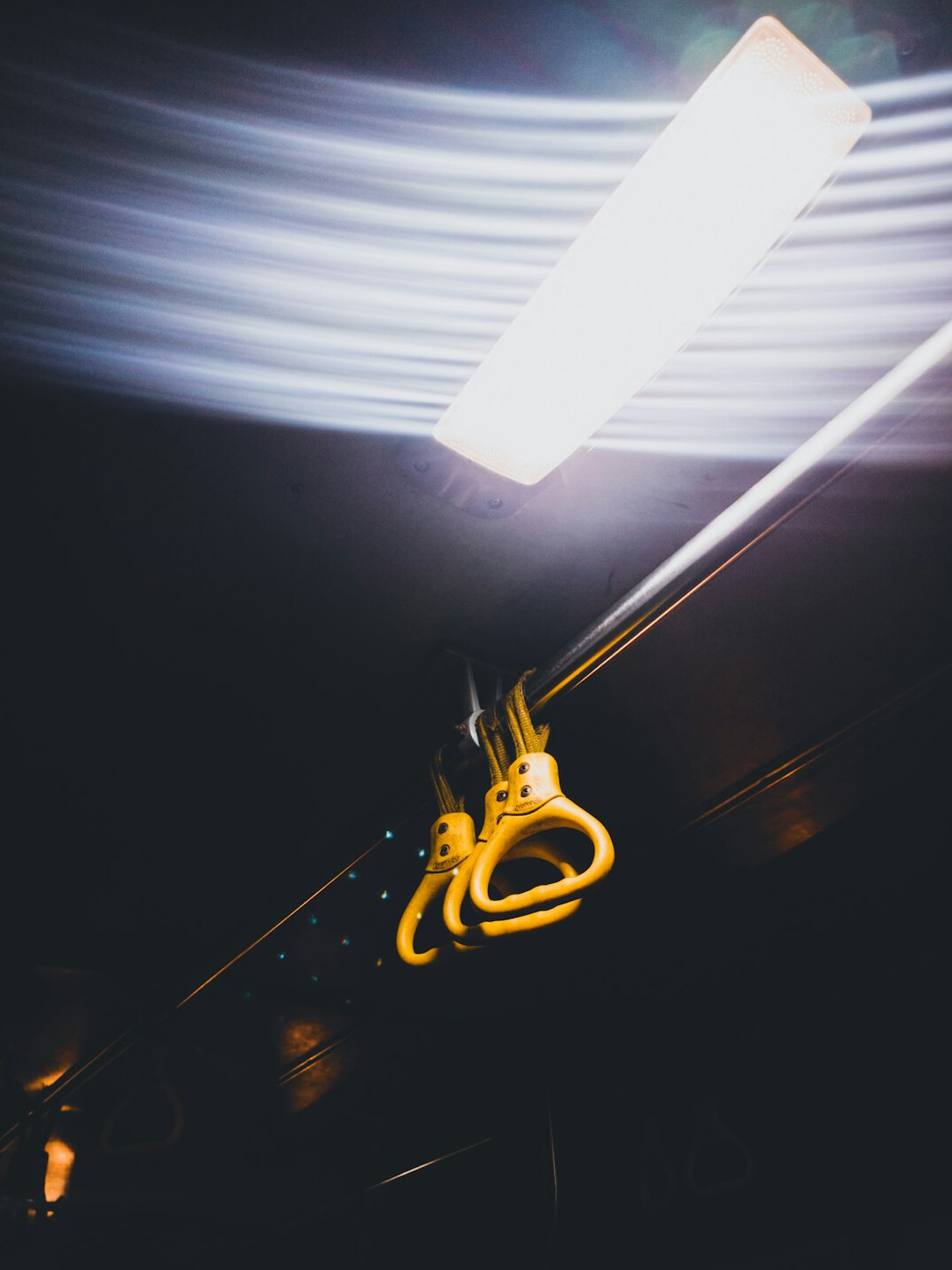 Studio lighting rig hanging above a television set