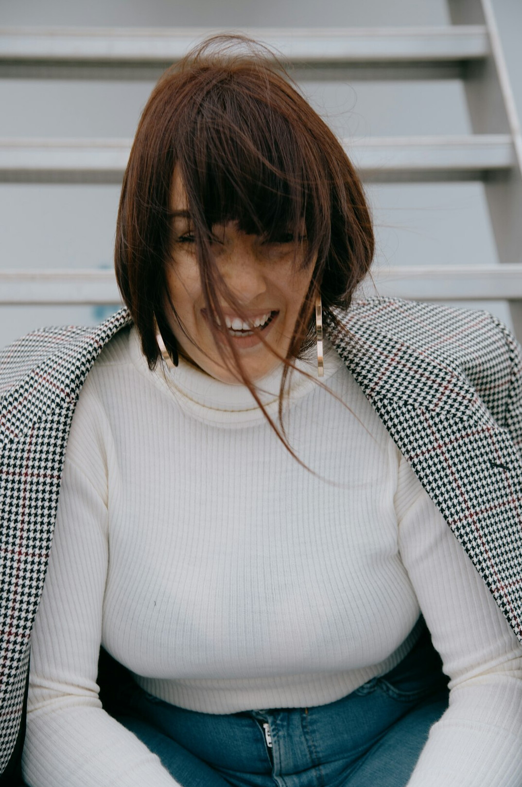 Portrait of a smiling woman in a blazer
